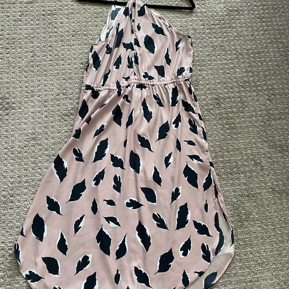 Leaf pattern dress with halter neck and split sides on legs with a drawstring